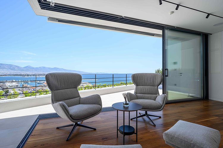 Lounge corner με μεγάλο γωνιακό κούφωμα με κρυφούς οδηγούς